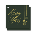 A stack of square dark green paper cards with metallic gold foil writing that reads 'Merry Merry' and gold hanging ornament illustrations, shown on a plain white background.