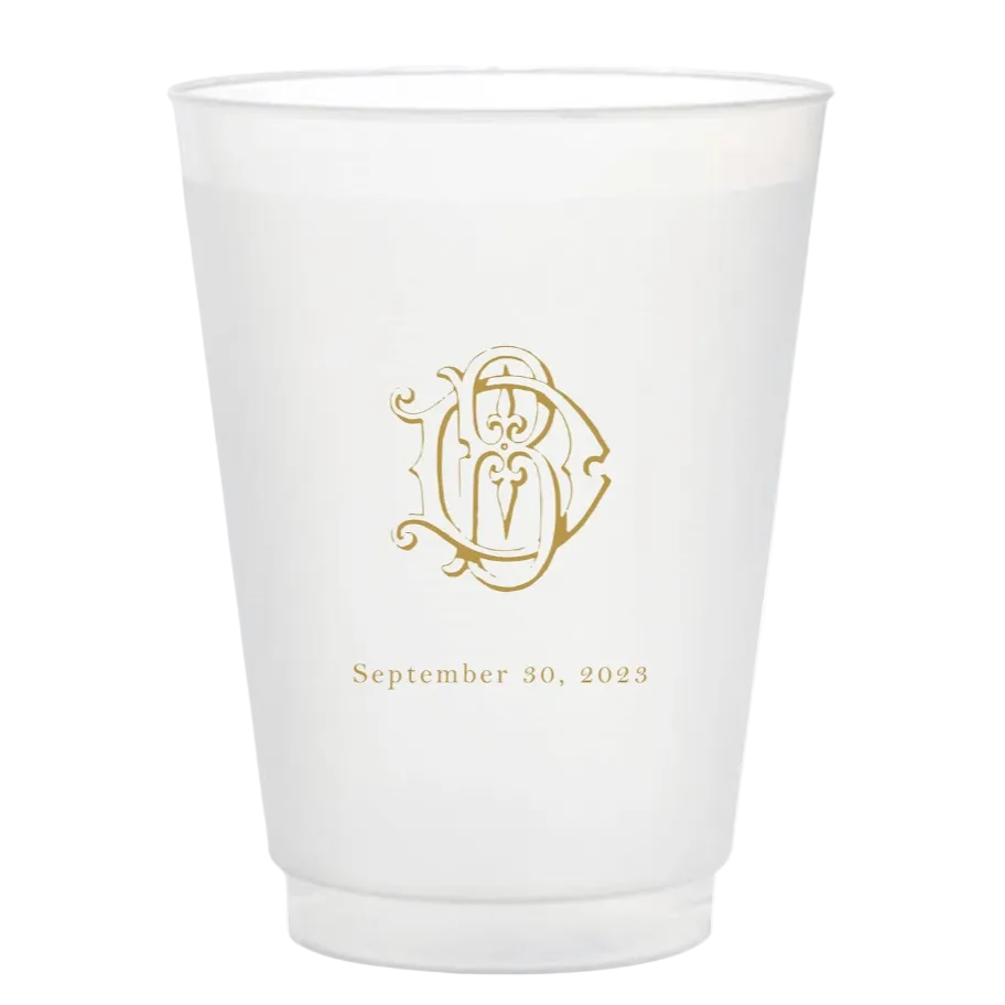 White cup with gold logo and text on a white background
