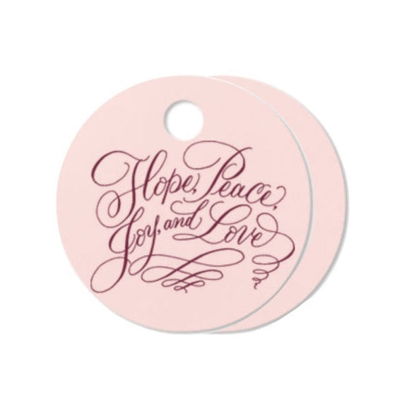 Pink round tag with 'Hope Peace Joy Love' text on a white background