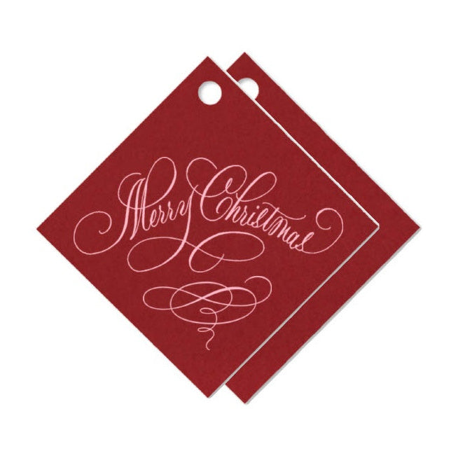 Two red 'Merry Christmas' gift tags on a white background