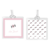 Girl's Watercolor Silver Rattle with Pink Bow Square Laminated Bag Tag